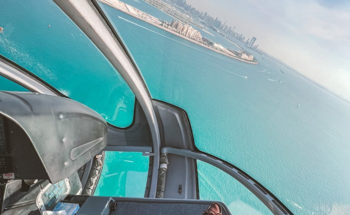 a man is sitting in the cockpit of a plane