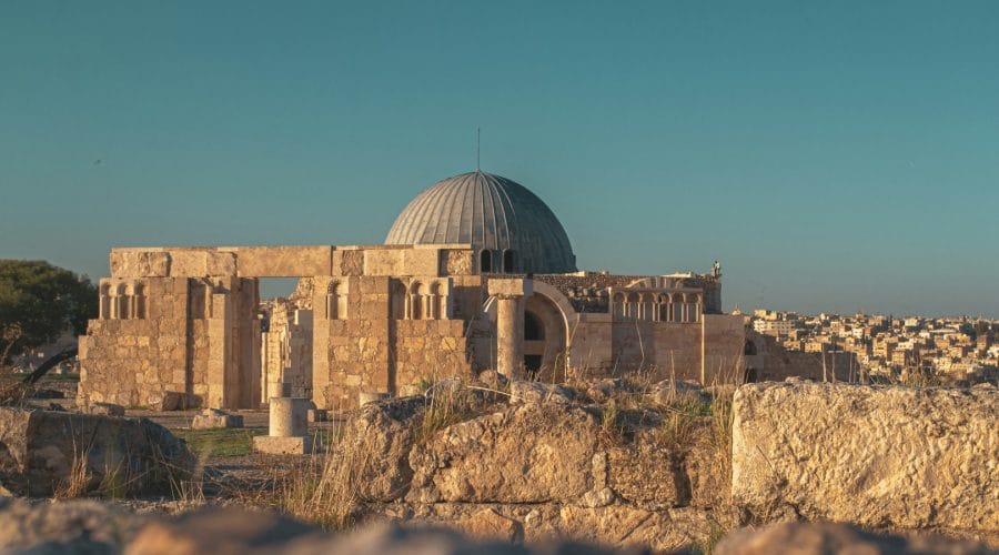 brown concrete building under blue sky during daytime